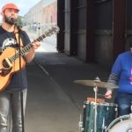 The Music Barn - musicians face the west side of the alley